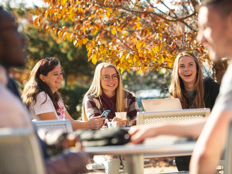 Students eating on patio